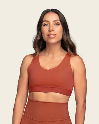 Top deportivo espalda atlética con detalles en tul#color_336-rojo-canela