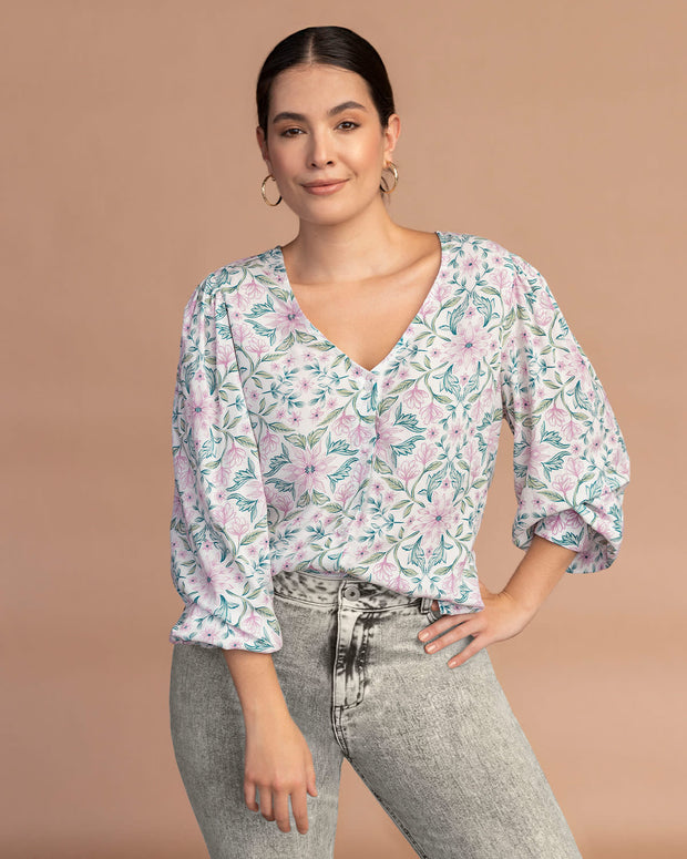Blusa manga larga estampada cuello en V