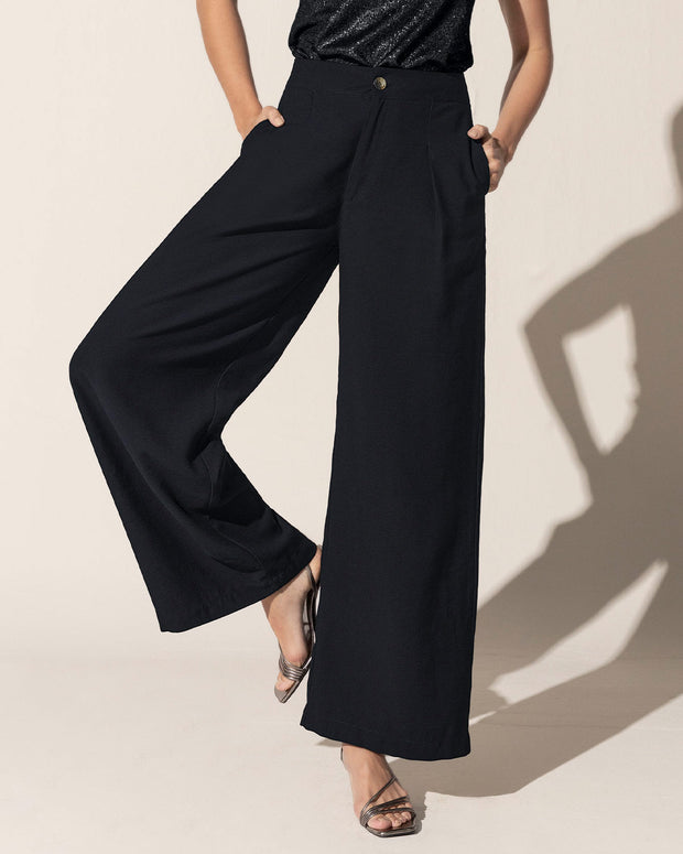 Pantalón bota ancha con prenses decorativos en frente