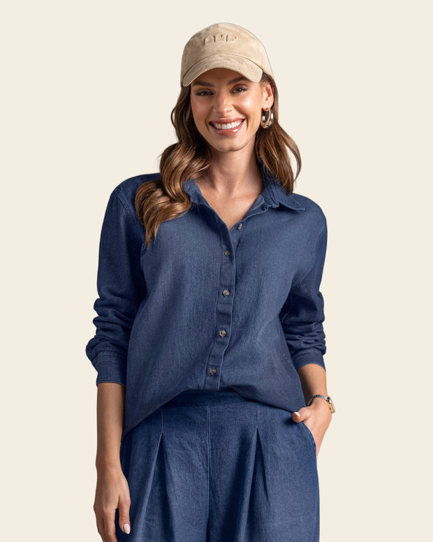 Blusa manga larga de cuello camisero con botones funcionales en frente