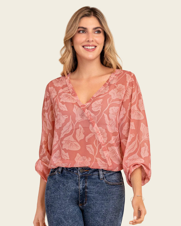 Blusa manga larga estampada con elástico en puños