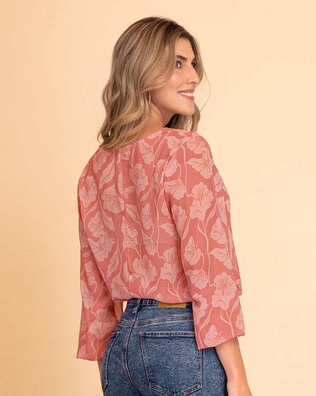 Blusa manga larga estampada con elástico en puños