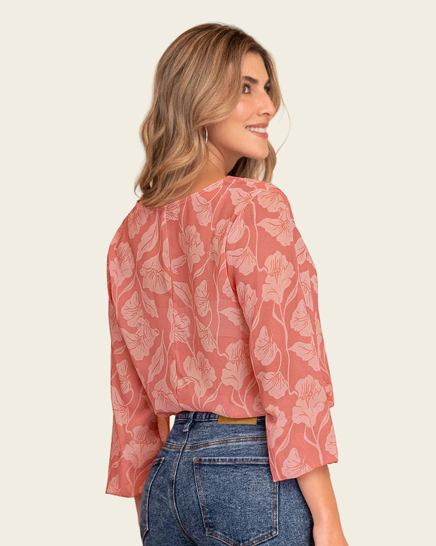 Blusa manga larga estampada con elástico en puños