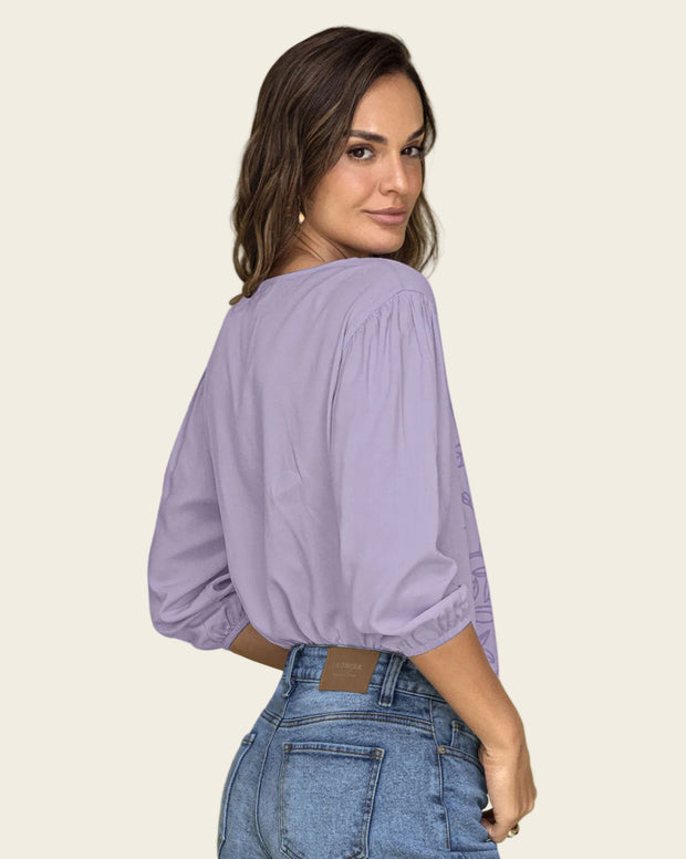Blusa 3/4 con estampado en frente