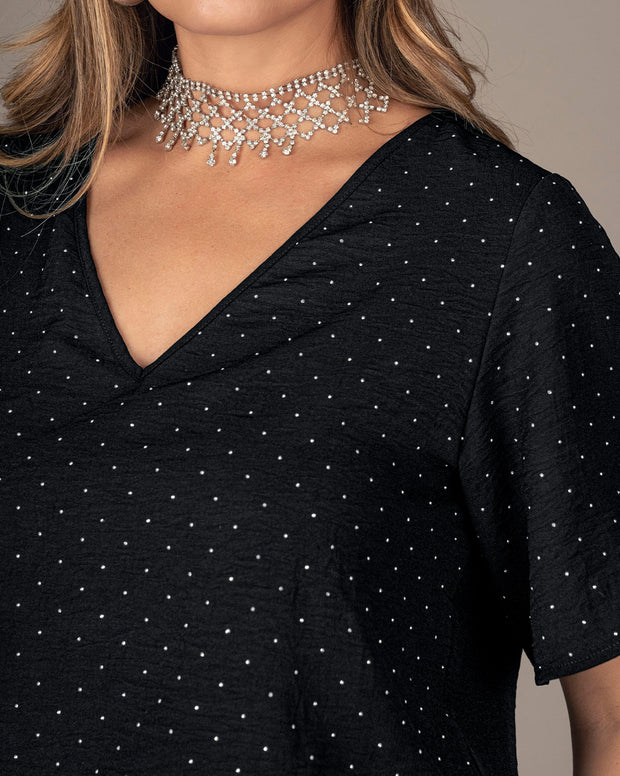 Blusa manga corta con apliques brillantes