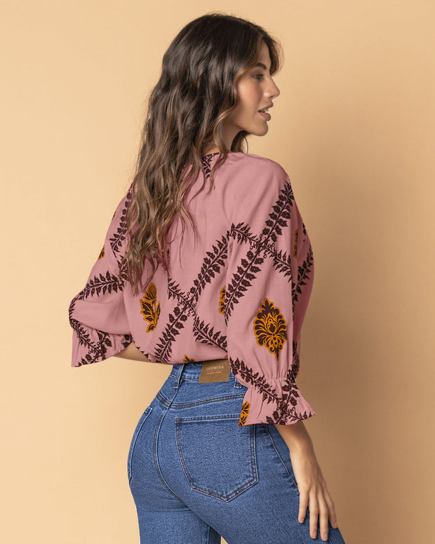 Blusa estampada manga 3/4 con elástico y bolero en puños