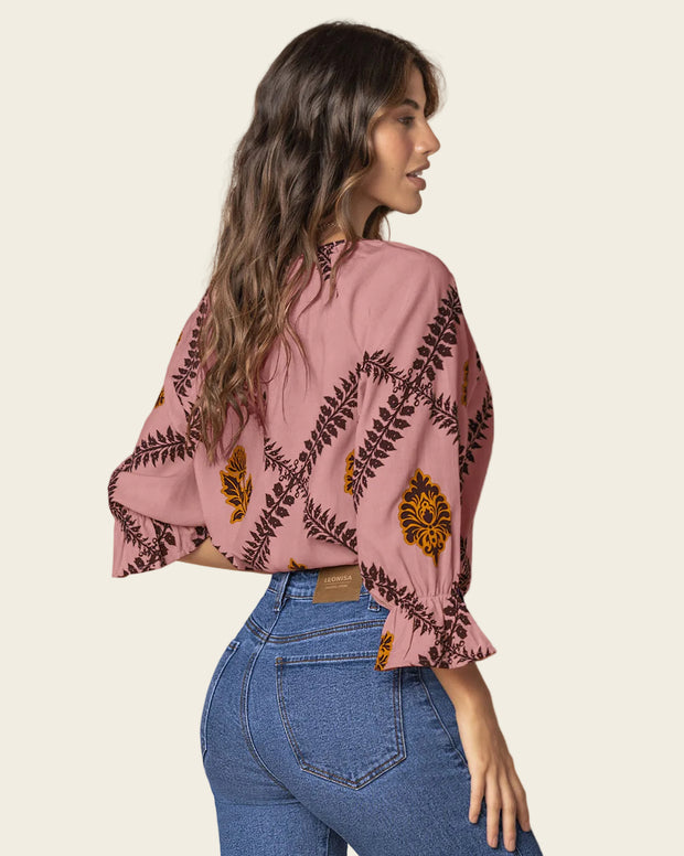 Blusa estampada manga 3/4 con elástico y bolero en puños
