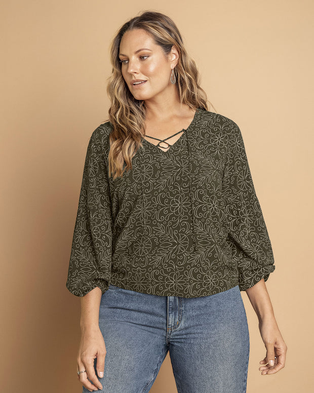 Blusa manga larga con tiras en escote en V