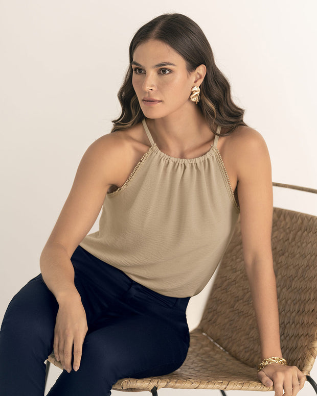 Blusa cuello halter en tela craquelada