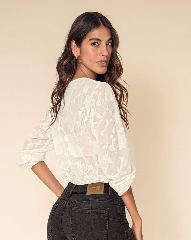 Blusa manga larga con volumen en tela con textura y transparencia
