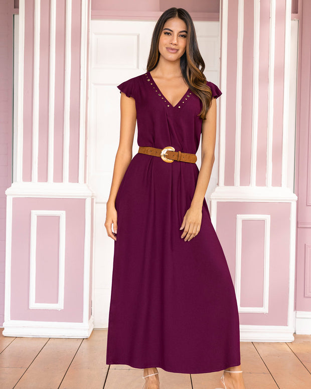 Vestido largo con taches y ojaletes metálicos