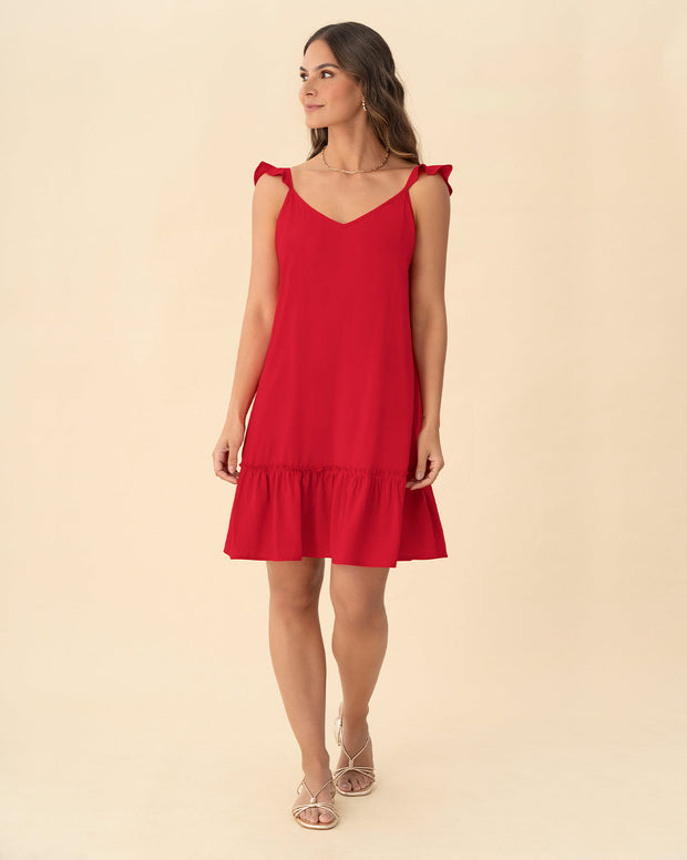 Vestido corto con bolero en mangas y ruedo