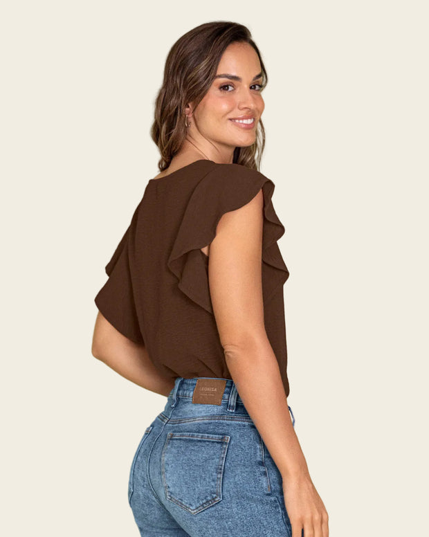 Blusa con boleros en mangas en tela craquelada