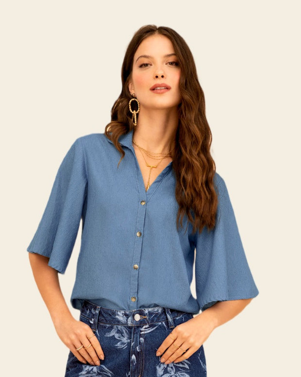 Camisa manga corta amplia con botones funcionales