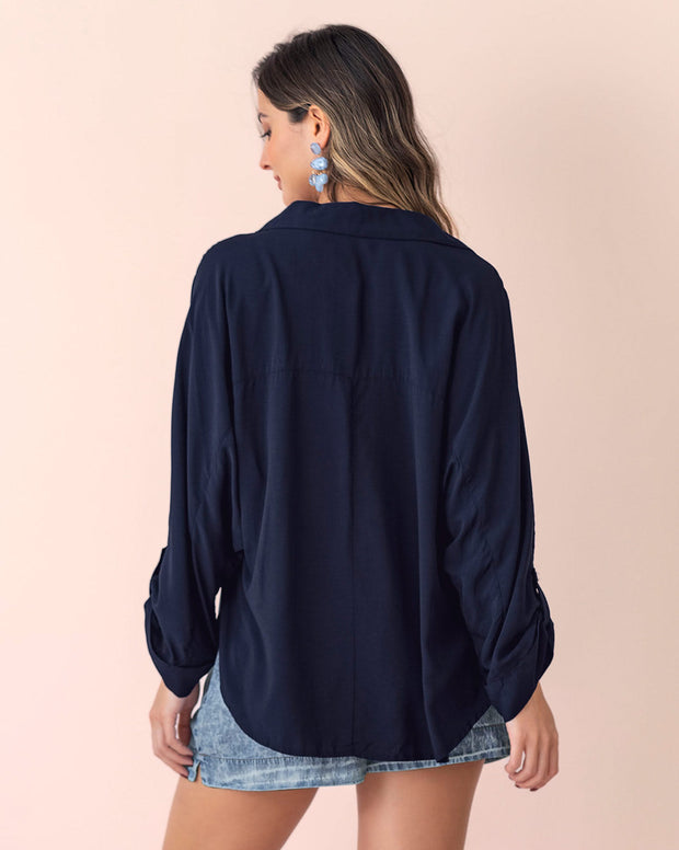 Blusa manga larga abotonable con charreteras en mangas
