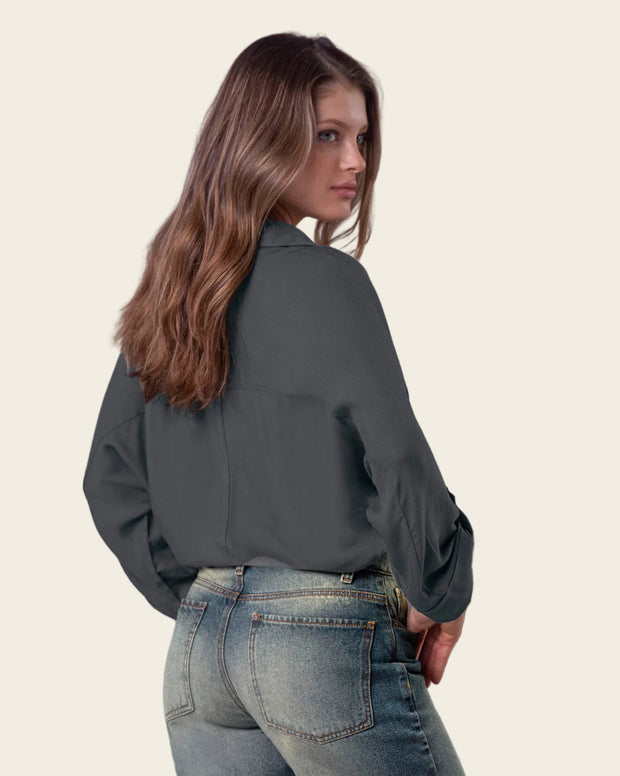 Blusa manga larga abotonable con charreteras en mangas
