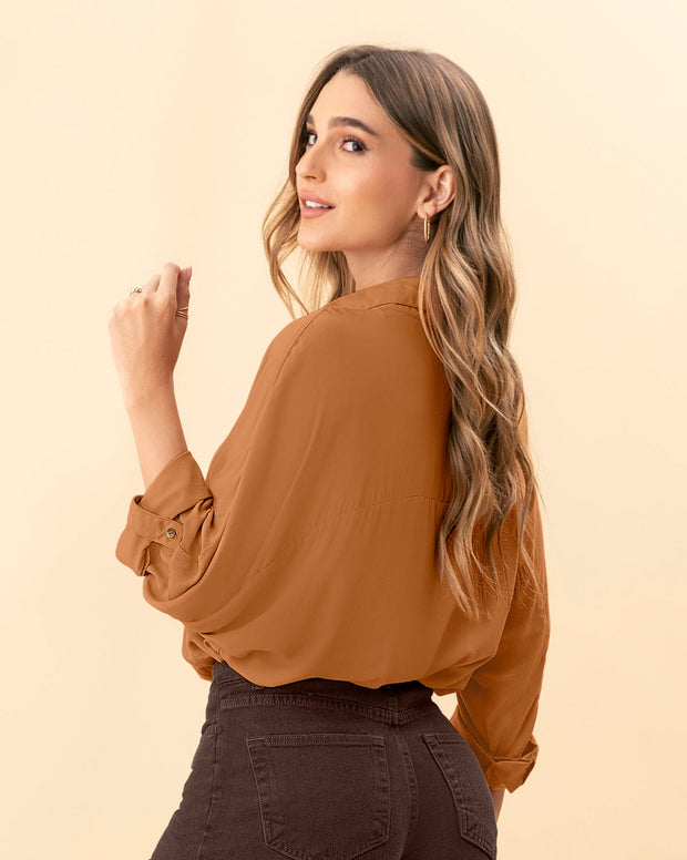 Blusa manga larga abotonable con charreteras en mangas