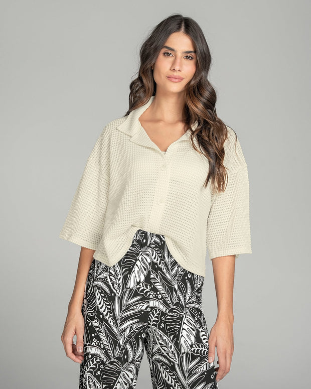 Camisa manga 3/4 con cuello camisero sport y perilla funcional