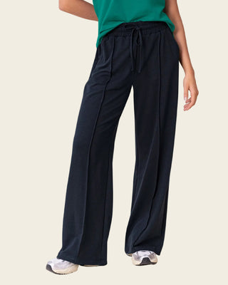 Pantalón tipo jogger con bota ancha#color_700-negro