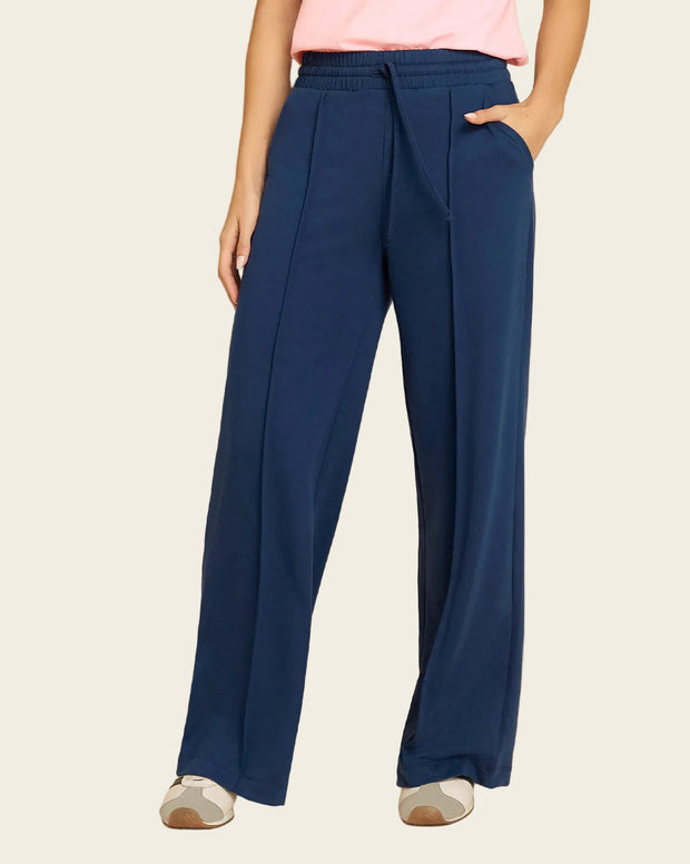 Pantalón tipo jogger con bota ancha