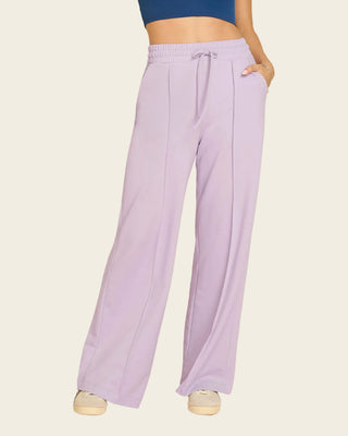 Pantalón tipo jogger con bota ancha#color_c51-lila