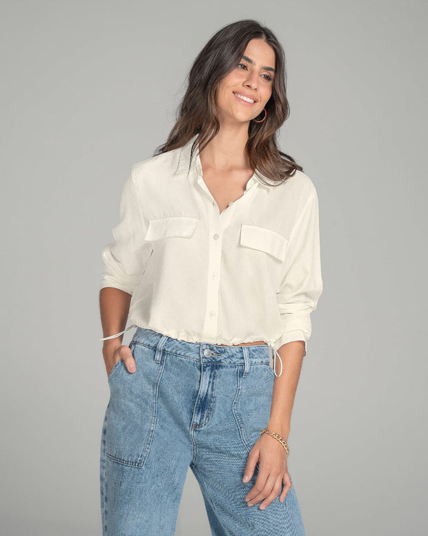 Blusa manga larga con perilla funcional y elástico en ruedo