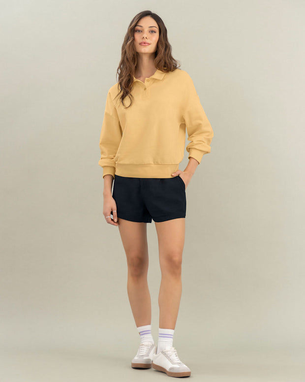 Camiseta manga larga tipo polo para mujer