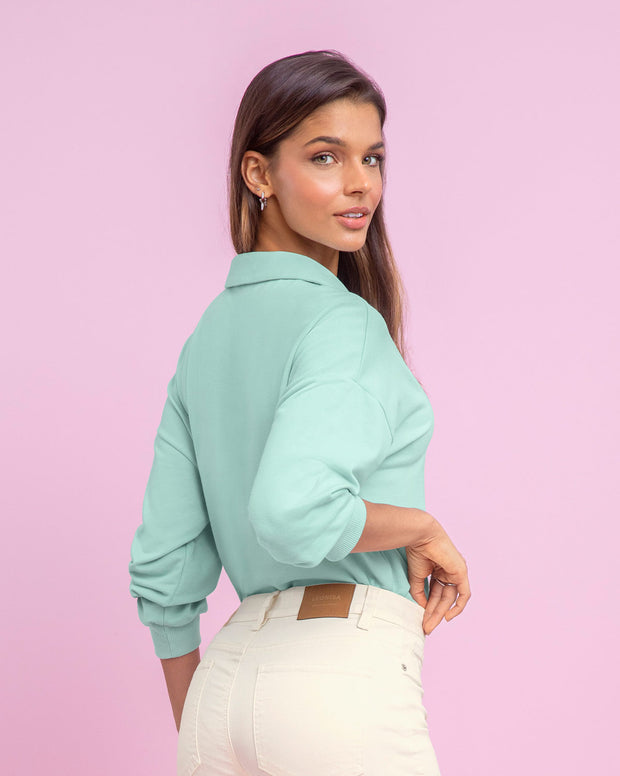 Camiseta manga larga tipo polo para mujer