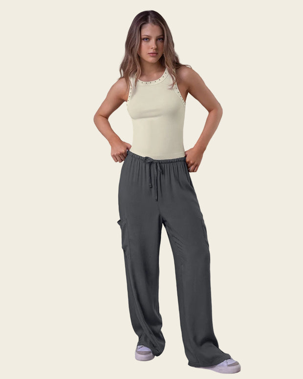 Camiseta manga sisa con taches en cuello y sisa