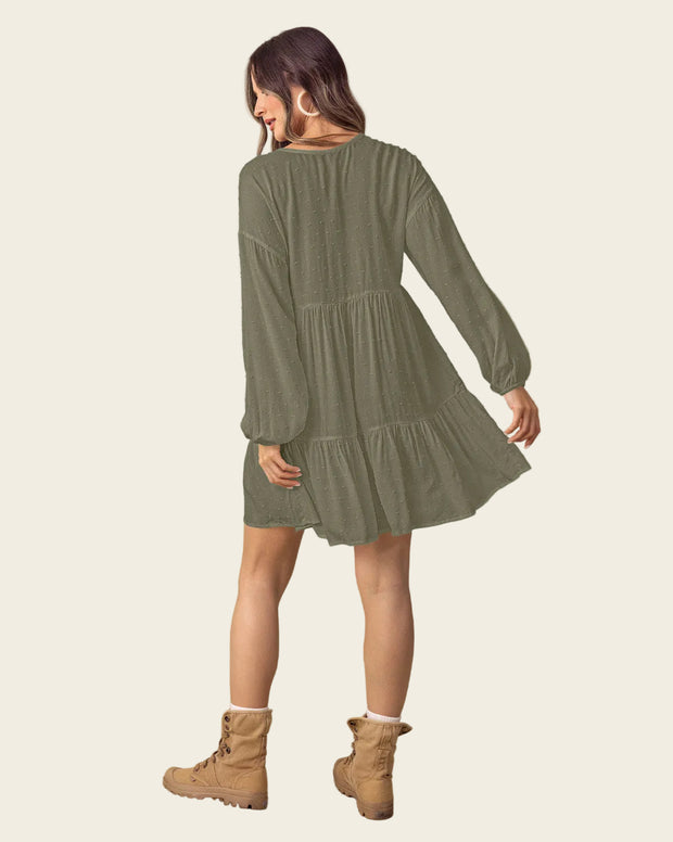 Vestido corto con volumen en mangas