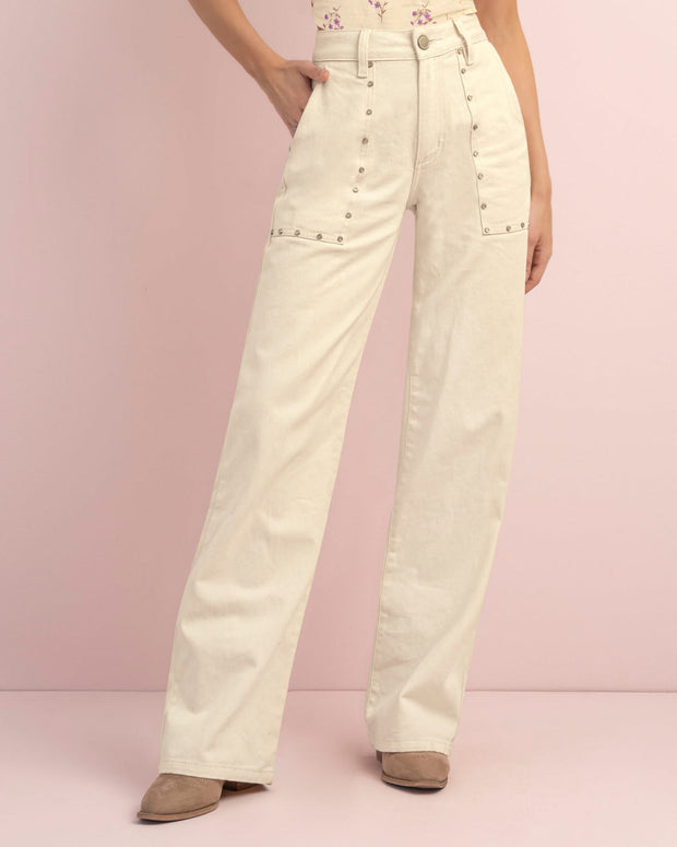 Pantalón bota recta con taches decorativos