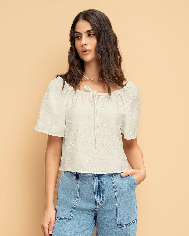 Blusa con estampado en relieve