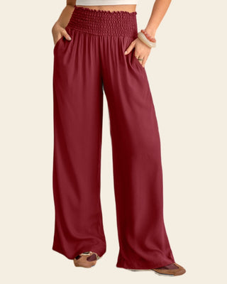 Pantalón bota ancha con nido de abeja en cintura#color_c55-vino