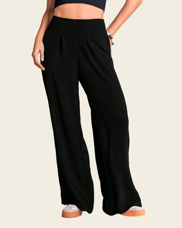 Pantalón bota ancha elaborado en tela con textura