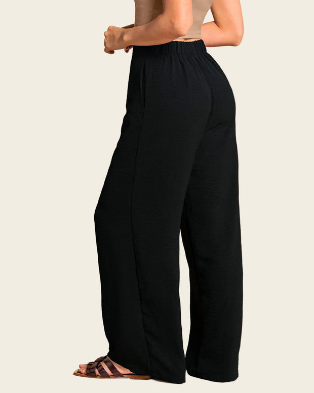 Pantalón bota ancha elaborado en tela con textura