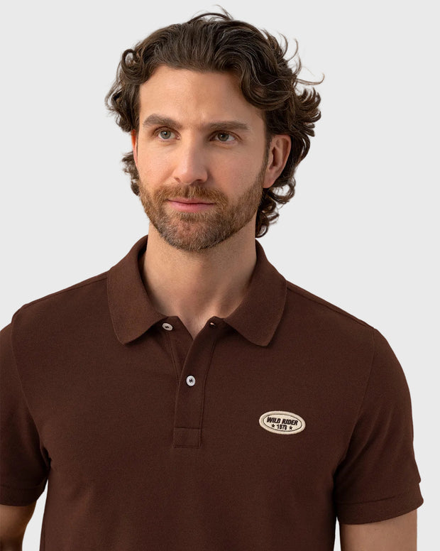 Camiseta tipo polo con aplique bordado