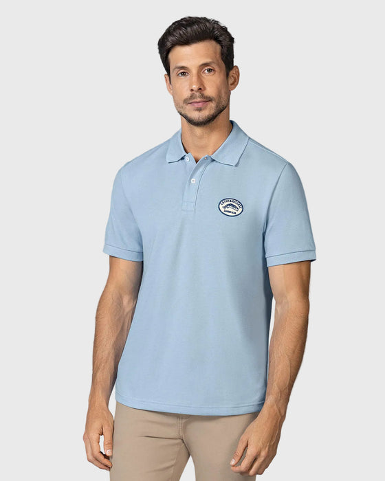 Camiseta tipo polo con aplique bordado#color_c67-azul
