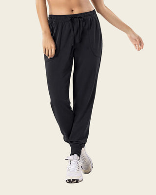 Jogger deportivo de silueta amplia con bolsillos#color_700-negro