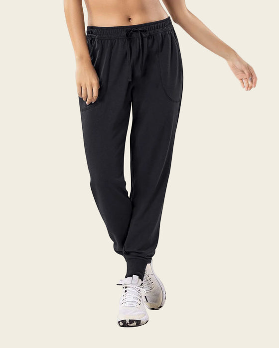 Jogger deportivo de silueta amplia con bolsillos#color_700-negro