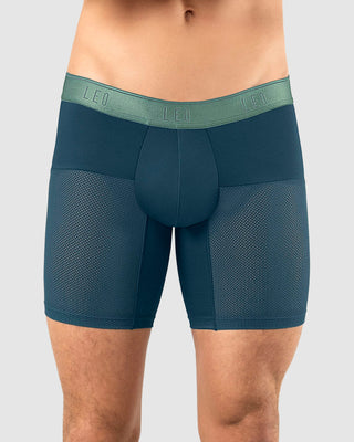 Bóxer medio de secado rápido con mallas transpirables en microfibra#color_057-fondo-azul-elastico-verde-claro