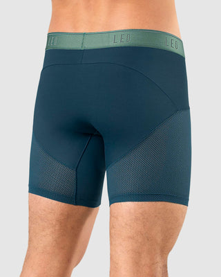 Bóxer medio de secado rápido con mallas transpirables en microfibra#color_057-fondo-azul-elastico-verde-claro