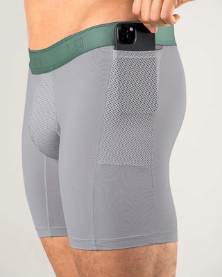 Bóxer deportivo con bolsillo lateral en microfibra#color_071-fondo-gris-elastico-verde-claro