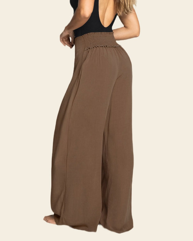 Pantalón tipo lino con tiras anudables en frente y elástico en espalda