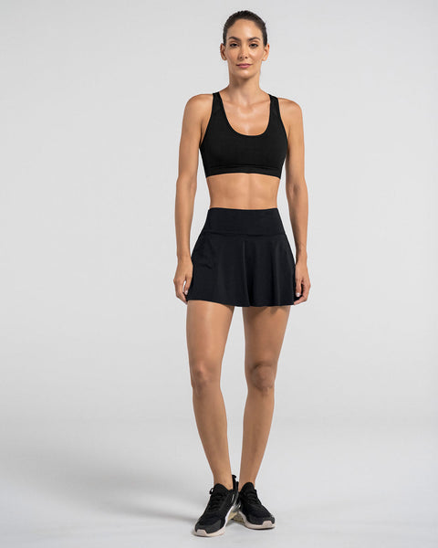 Falda deportiva con short interno con bolsillo#color_700-negro