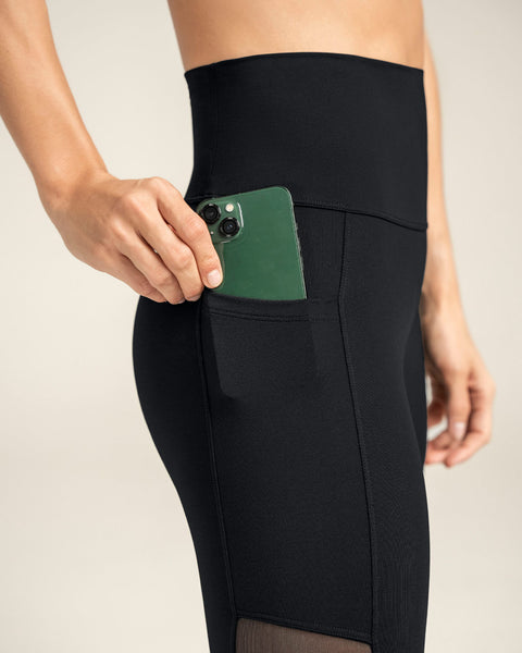 Legging deportivo con bolsillo lateral y detalles en tul#color_700-negro