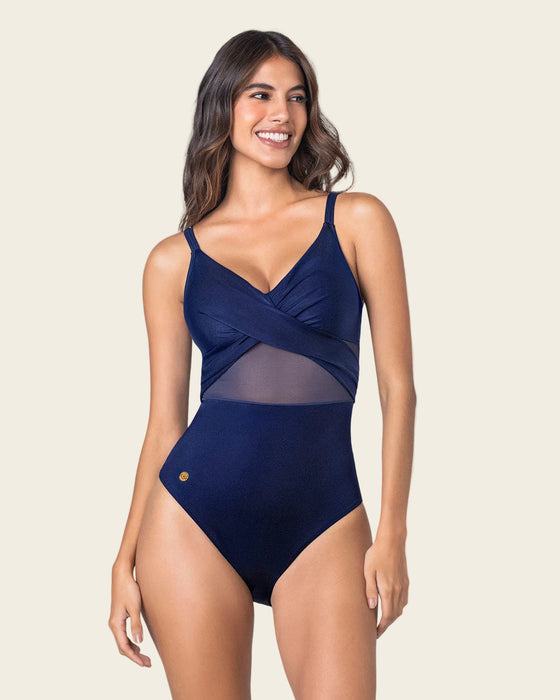 Vestido de baño entero con escote cruzado y tela con brillo#color_509-azul-oscuro
