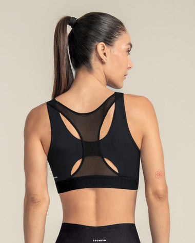 Top deportivo espalda atlética con detalles en tul#color_700-negro
