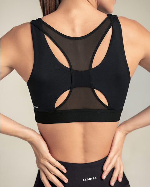 Top deportivo espalda atlética con detalles en tul#color_700-negro