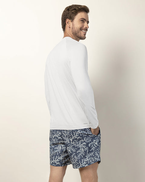 Pantaloneta de baño masculina con práctico bolsillo al lado derecho#color_a03-estampado-corales-azul