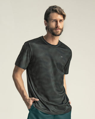 Camiseta deportiva masculina con tecnología de secado rápido#color_661-estampado-verde